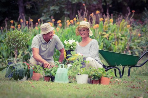 Gardening team preparing a small Westminster terrace garden for maintenance