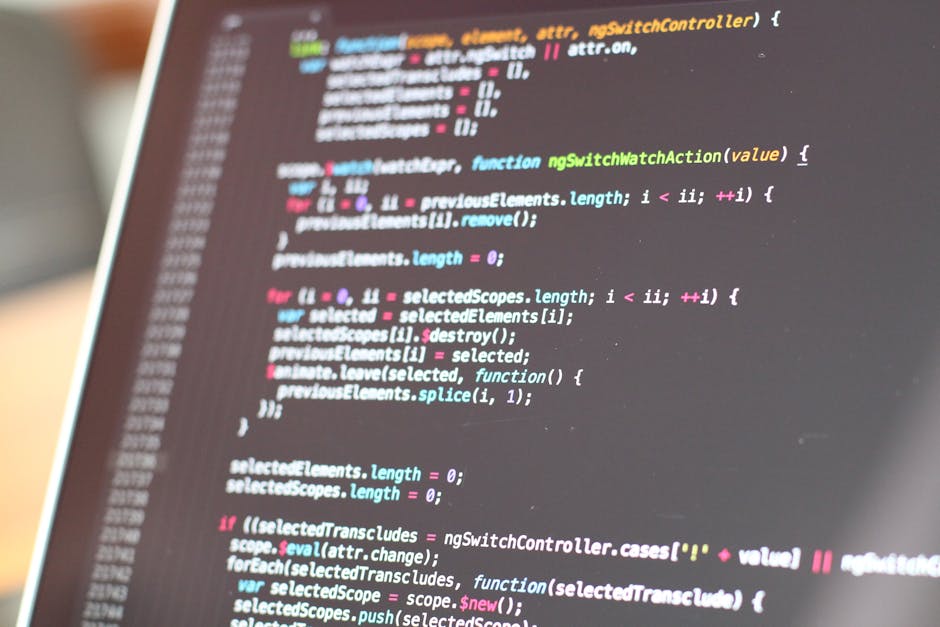 Close-up of a computer screen displaying HTML code, highlighting sections related to web navigation and content control, with lines of markup including 'Previous' and 'Next' buttons, and a comment ind